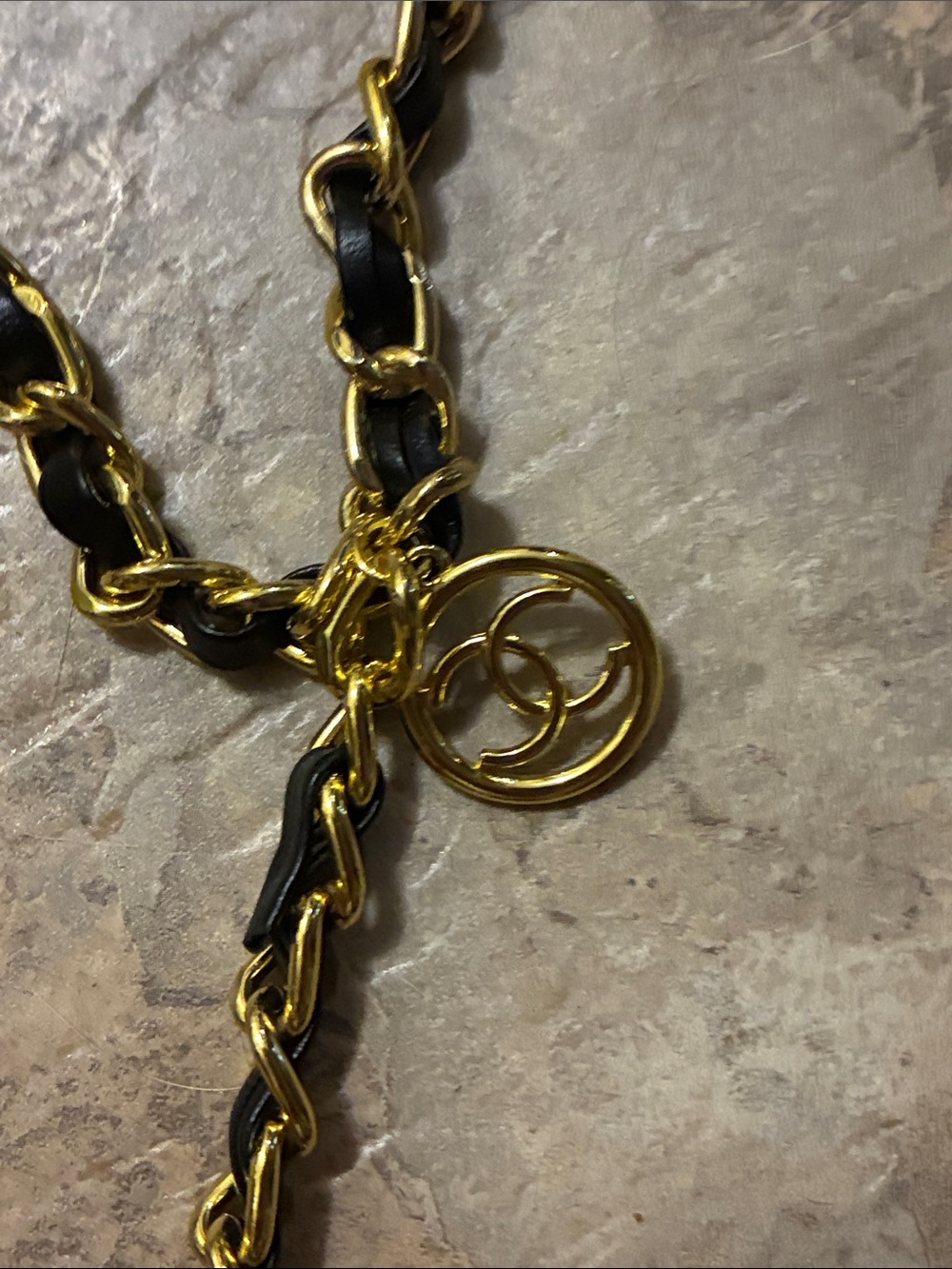 CHANEL Gold and Black Chain-Link purse accent with Interlocking Circle Charm